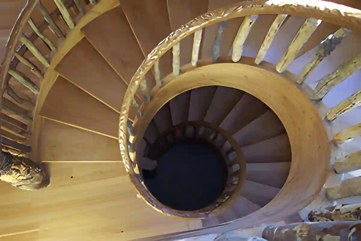 Hand-finished wood stair detail in a Bervid home