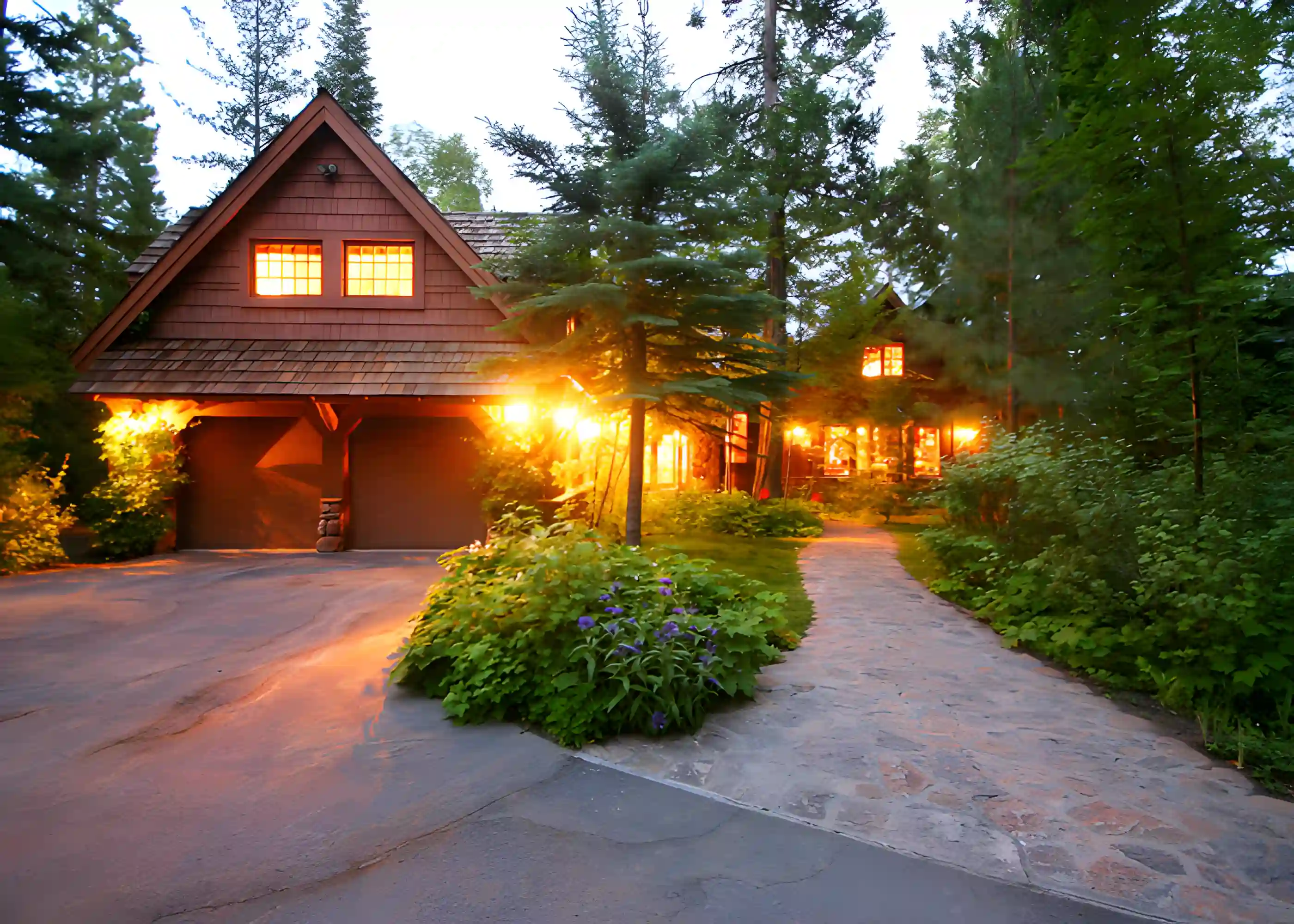 Rustic two-story residence framed by pine trees
